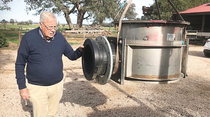 Gippsland inventor Fred Sundermann with his water turbine. Photo: Philip Hopkins